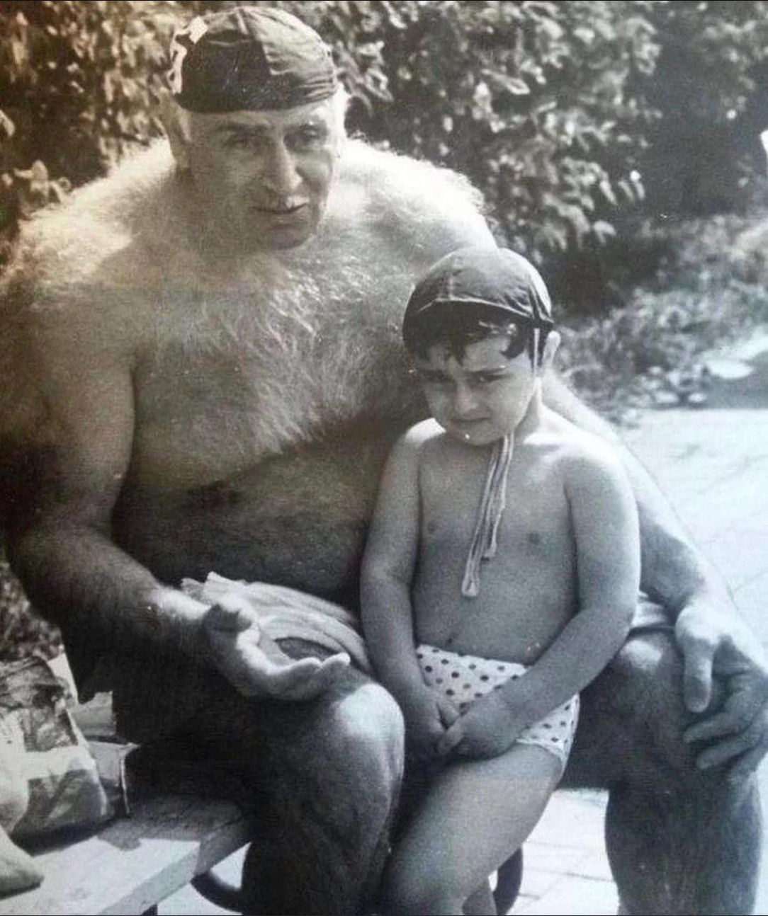 This legendary Soviet Georgian water polo player, Pyotr Mshvenieradze with his grandson, pic from 1990s