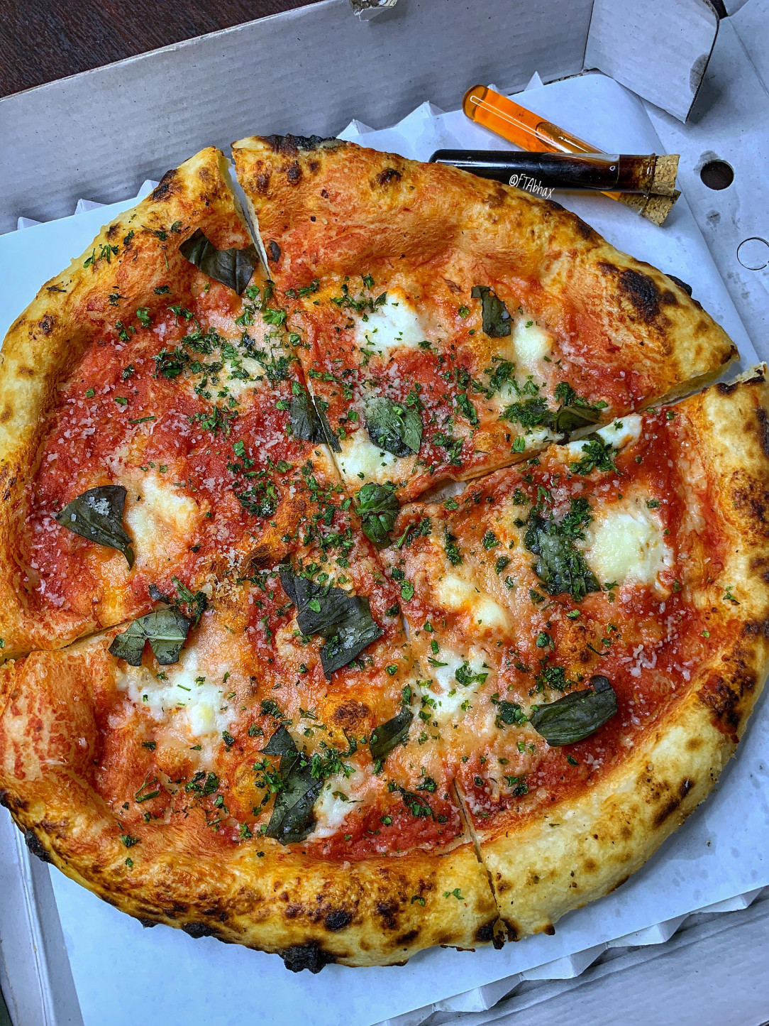 Napoli style Margherita Pizza - mozzarella cheese, basil and marinara sauce with Chilli oil and balsamic vinegar