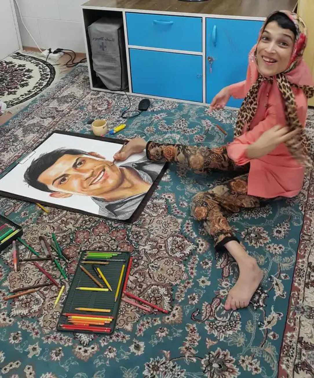 Physically Challenged Iranian Artist Becomes Internet Sensation By Drawing Portraits Using Only Her Feet