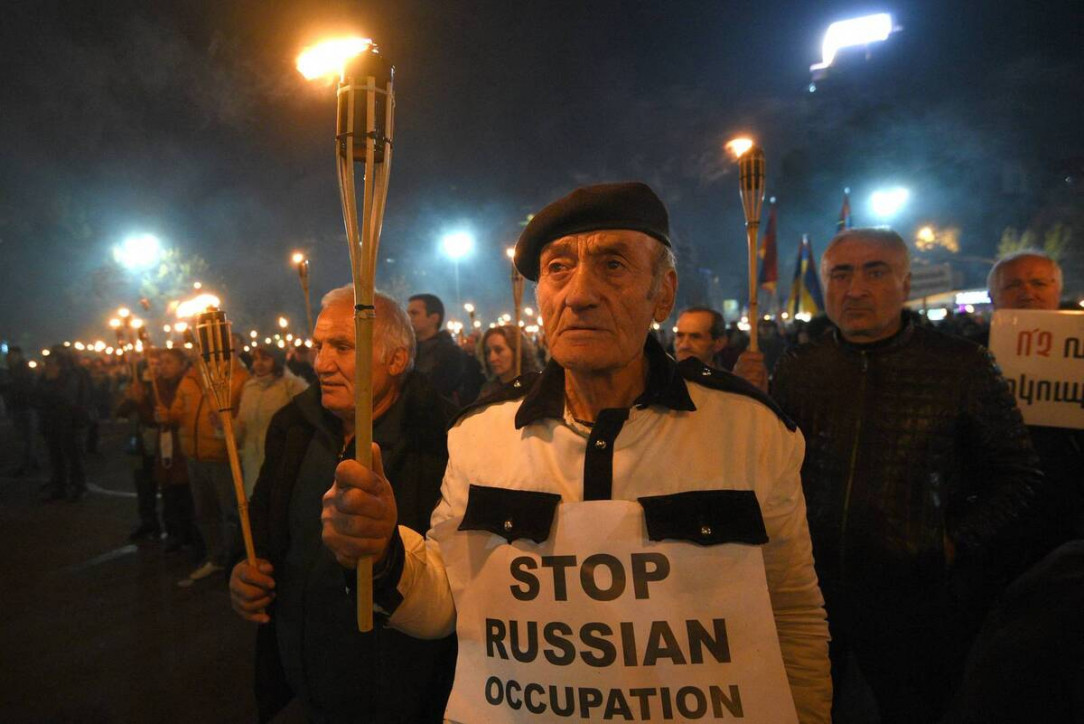 Armenians protest against Russian brutal occupation in Ukraine and their own government - AFP via Getty Images