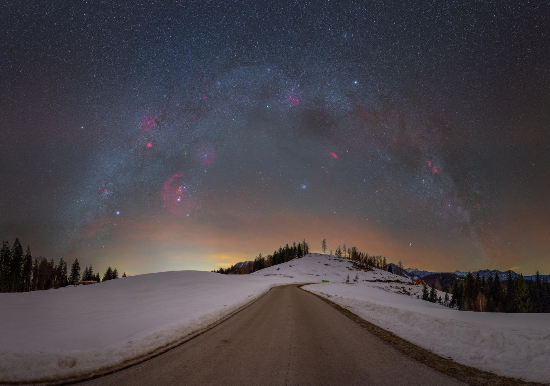 Winter Milky Way arch in Davca, Slovenia