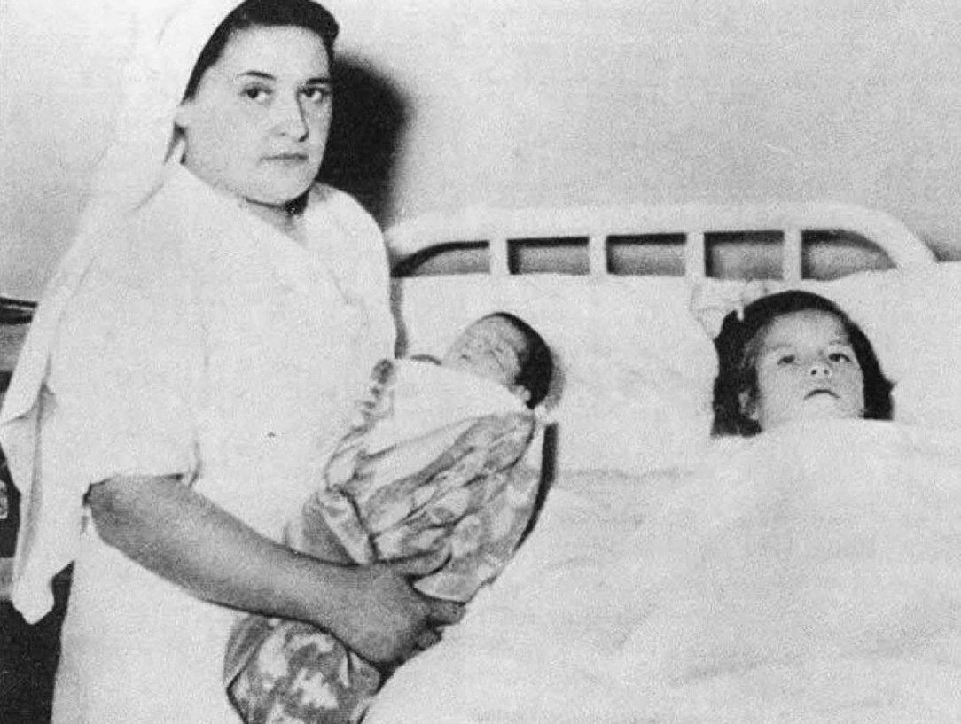 Lina Medina at age 5 with her new born son next to her. She was the youngest mother in history