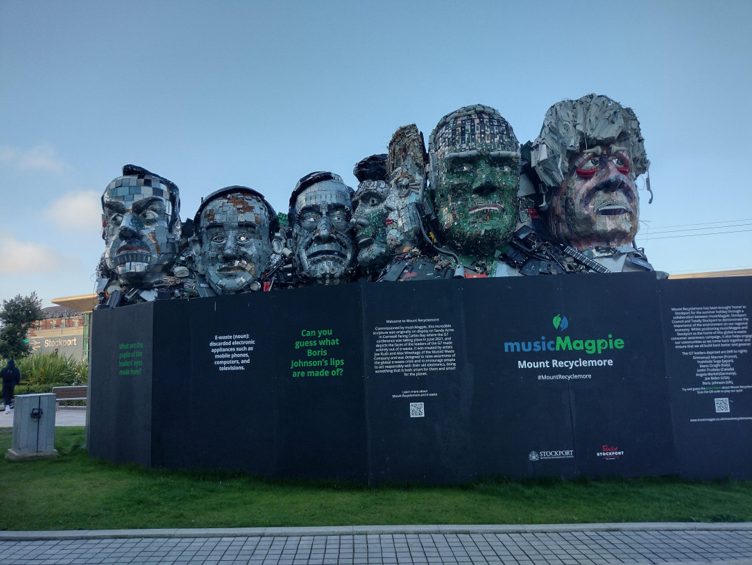 Really cool monument in Stockport, England. G7 leaders built out of e-waste