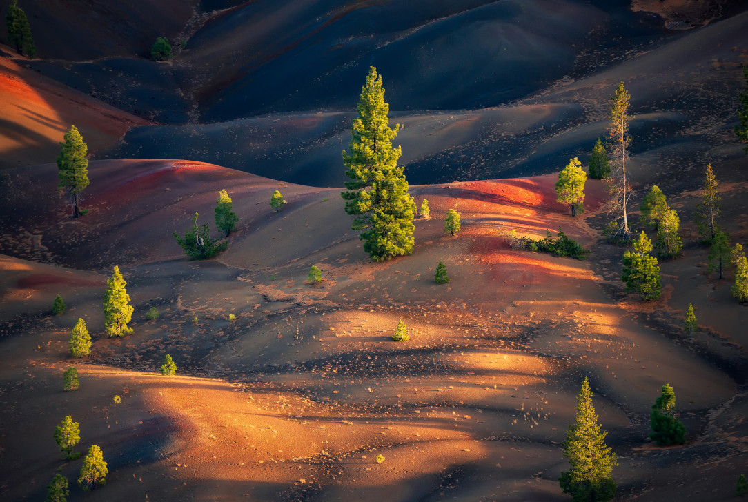 Painted Dunes in Lassen Volcanic National Park in California glowing during sunset
