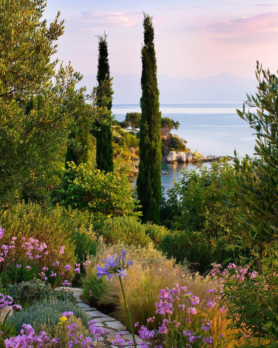Early-morning view out to sea from the gardens of the Kassiopia estate in Corfu, Greece