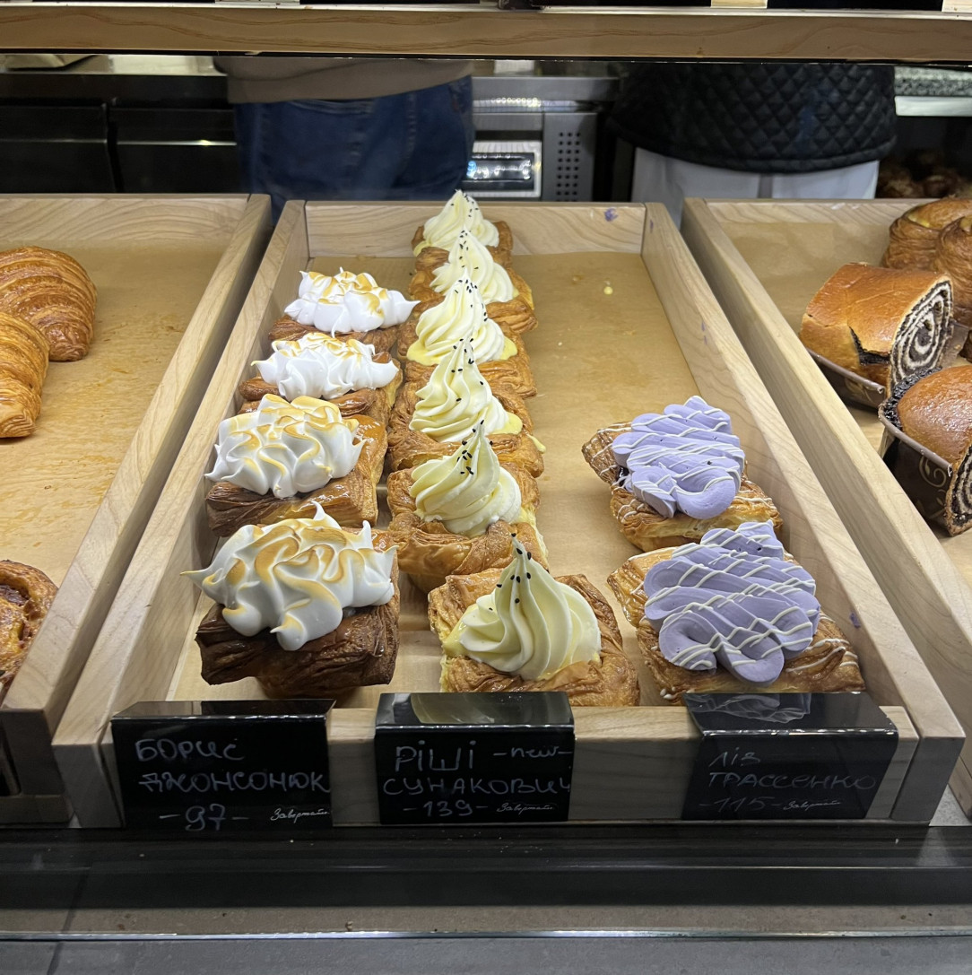 A Café in Kyiv Offering Pastries Named After Boris Johnson (left/ €2. 3), Rishi Sunak (middle/ €3. 3), and Liz Truss (right €2. 7)