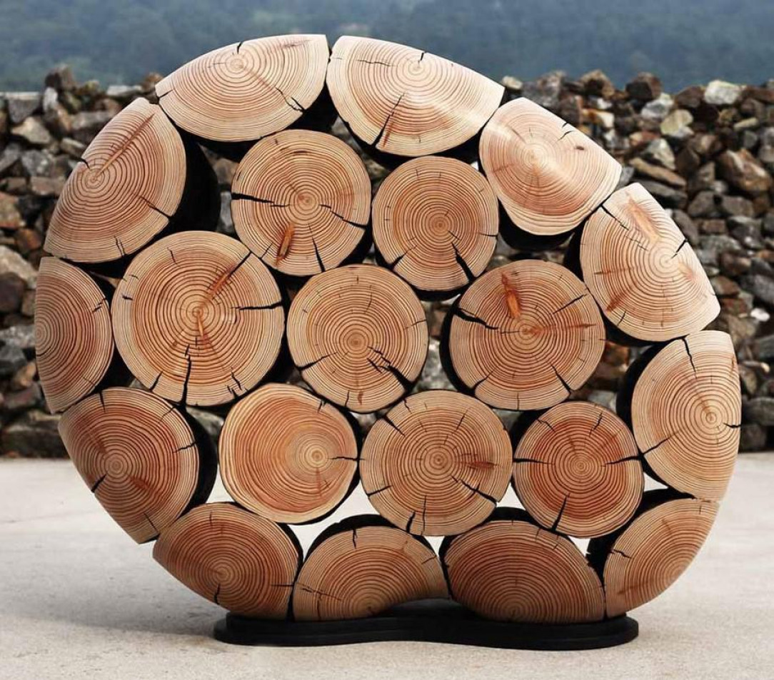 Art sculpture by South Korean artist Jae-Hyo Lee made from discarded tree trunks and branches