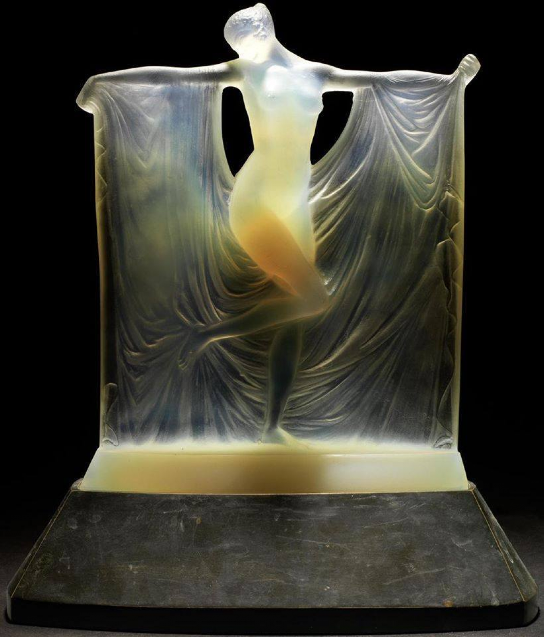 Opalescent Glass Statuette made in 1925 by Rene Lalique. It is 8¾ inches tall