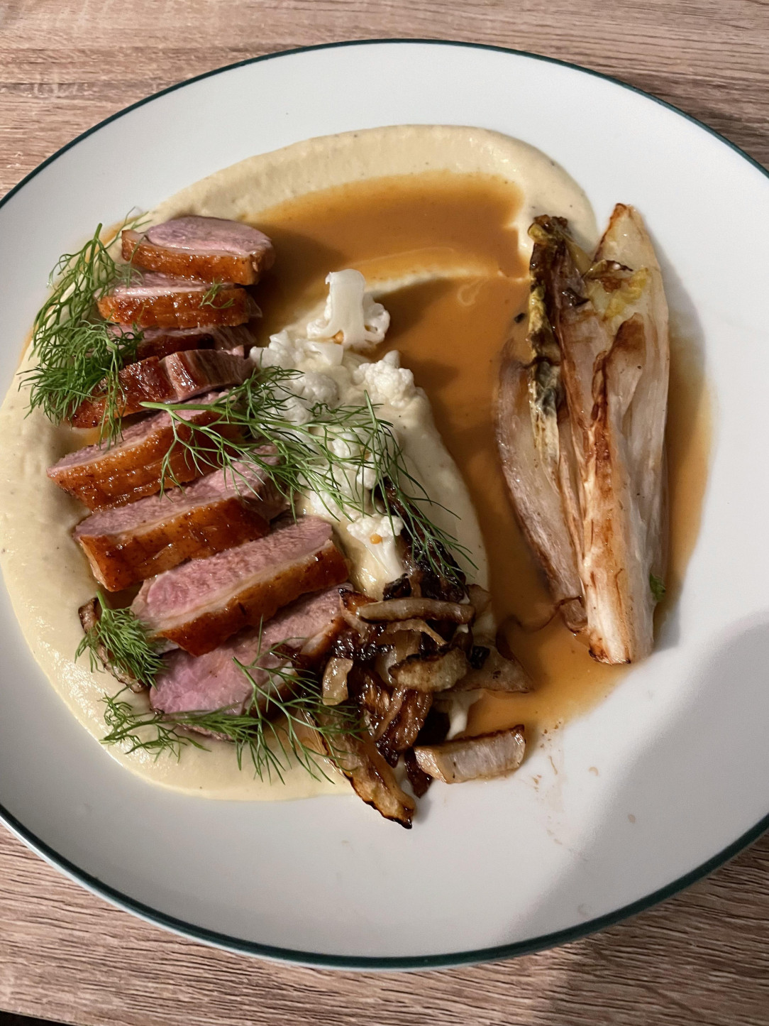 Seared duck breast, orange pan sauce, cauliflower and fennel purée, pickled cauliflower, roasted fennel and witlof