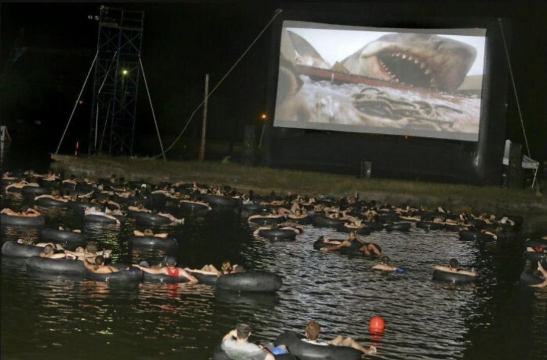 Watching a movie while relaxing on the water