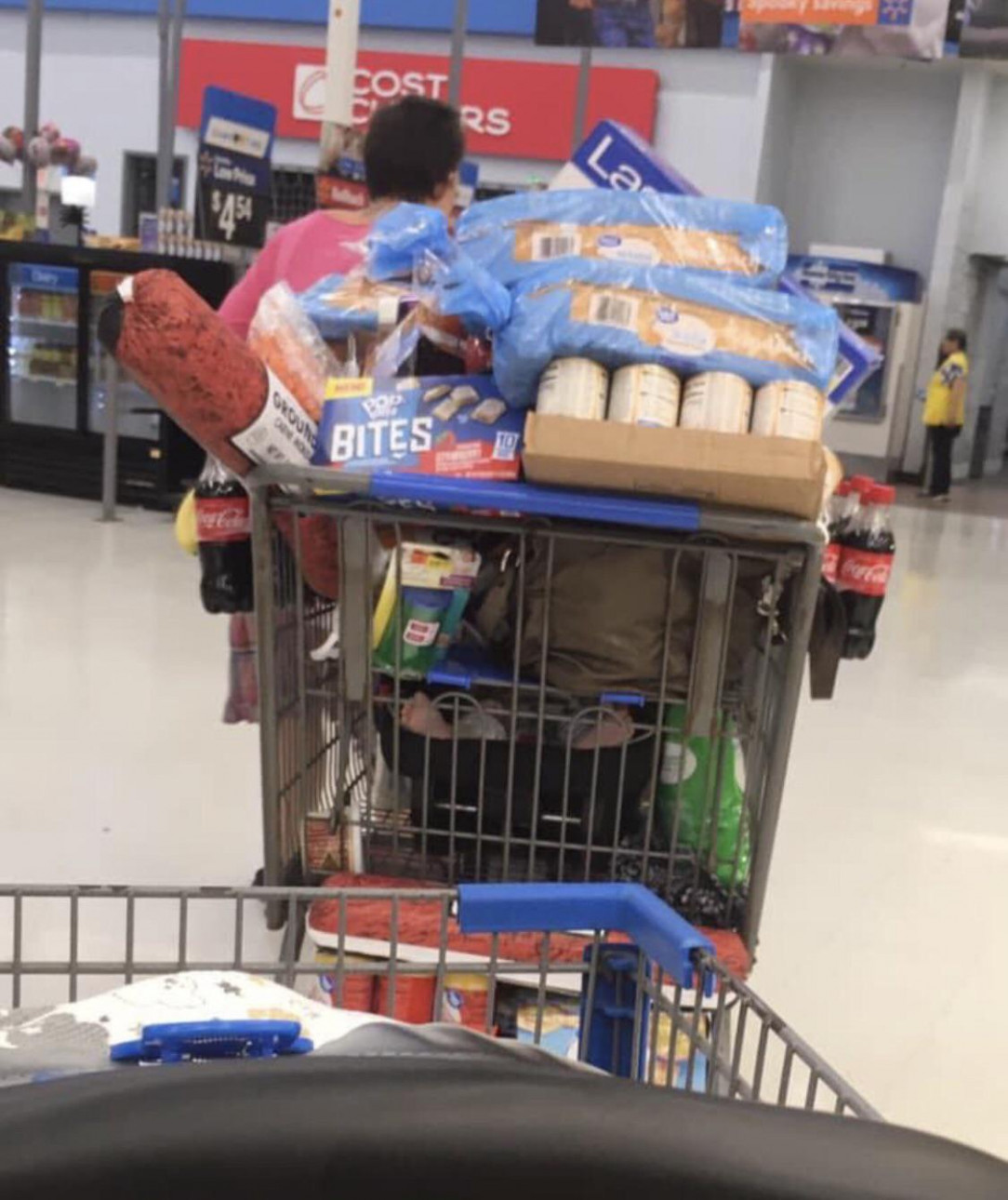 Baby under pile of Food