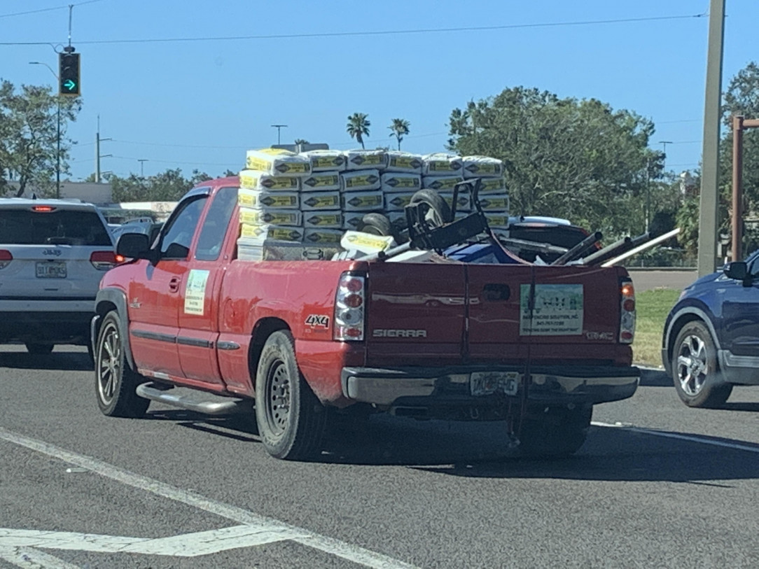 30 unrestrained bags of concrete. Have fun turning fella!