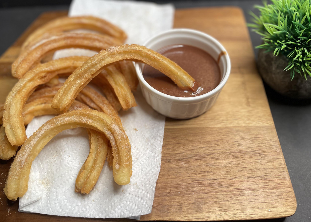 My first time making Churros served with warm Chocolate Sauce