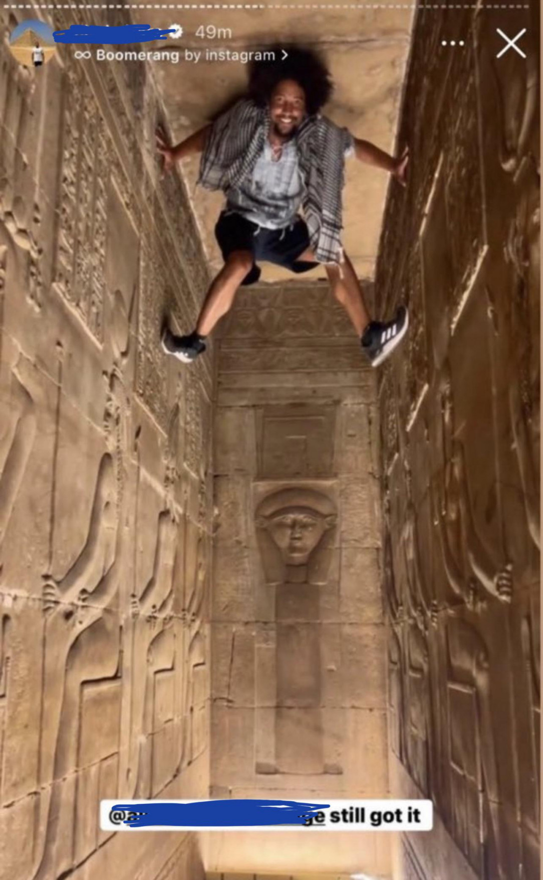 Tourist scales Ancient Egyptian Antiquities