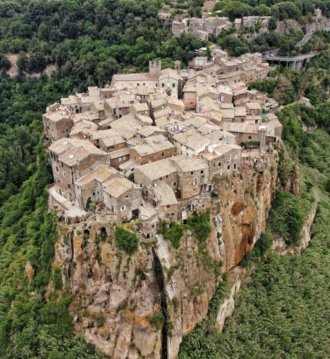 The village of Calcata, near Rome. Abandoned in the 20s and then repopulated by hippie artists from the 60s